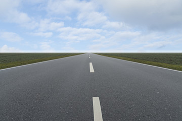 Street view with green field, blue sky and clouds.