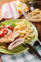 Cutlet Cordon Bleu with pork loin served with French fries and s