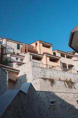 Sunset, golden light on the seaside village. Love Walk