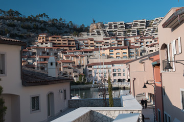 Sunset, golden light on the seaside village. Love Walk