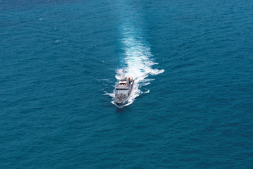 Grey modern warship,helicopter view