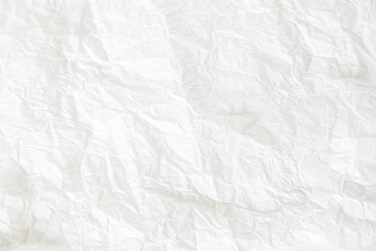 White crumpled paper background, horizontal image. Stylish, minimalistic, daylight.