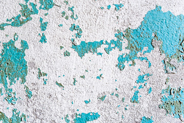 Old flaking paint on concrete background, wall texture