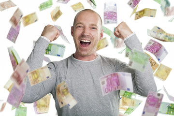 Happy man wins a lot of money in the lottery