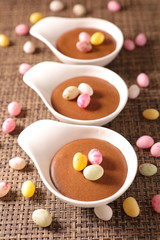 Obraz na płótnie Canvas chocolate mousse with candy egg for easter