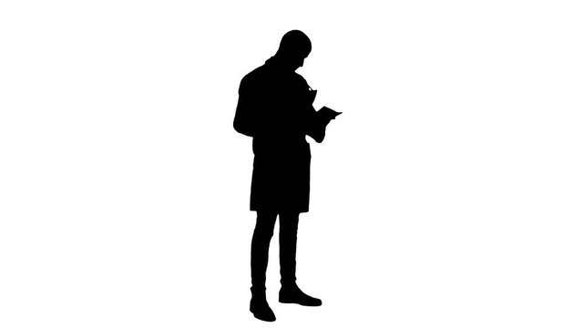 Silhouette Male doctor checking medical documents