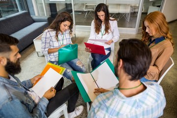 Executives working in office