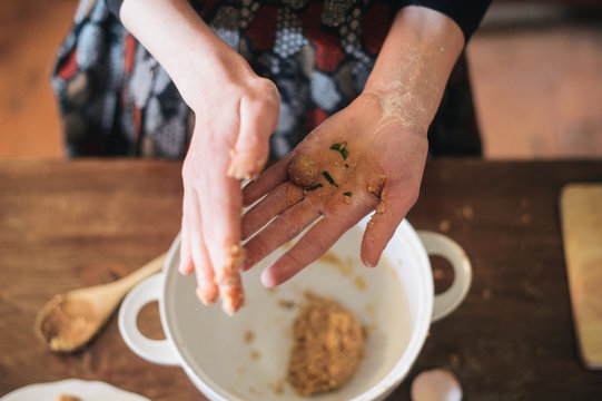 woman hands making meatballs
