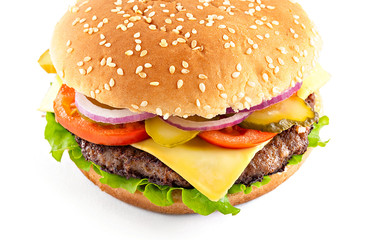 Classic cheeseburger isolated on white background. Close-up view.