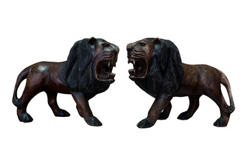 Handcraft wooden lion isolated on white background.