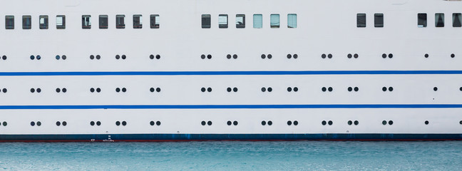 Many Portholes on Small Cruise Ship