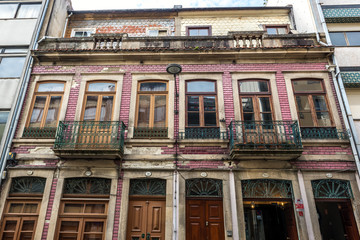Fototapeta na wymiar Front facade of residential building in Porto, Portugal