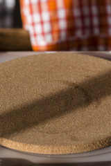 Cork pad on the table.