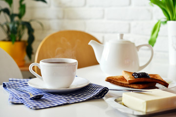 Cup of tea and teapot