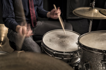 Fototapeta na wymiar Drummer playing a rhythm, swing, motion blur