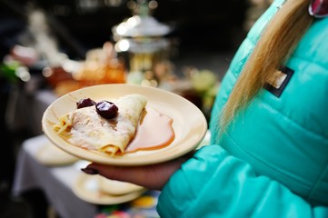 Pancakes with jam on a plate close up. Maslenitsa.Shrovetide