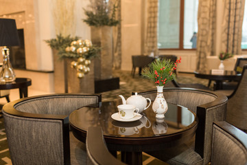 Tea and dessert on table