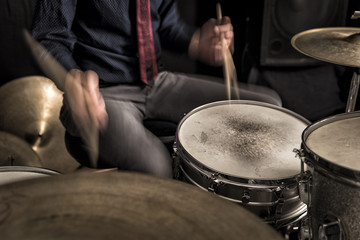 Fototapeta na wymiar Drummer playing a rhythm, swing, motion blur
