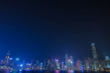 Fototapeta na wymiar Hong Kong cityscape waterfront over Victoria harbor, to night in Hong Kong, China