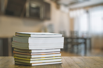 books on wooden table
