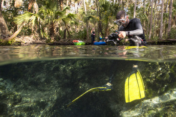 Man preparing underwater camera