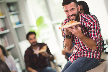 Corporate lunch break at work in company offices
