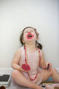Girl caught out playing with lipstick
