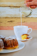 Fresh coffee with milk in cup with cookie Selective focus