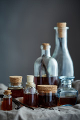 a group of bottles with home made vanilla extract