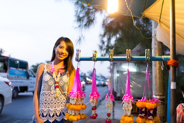 Woman shopping at hawker in thailand