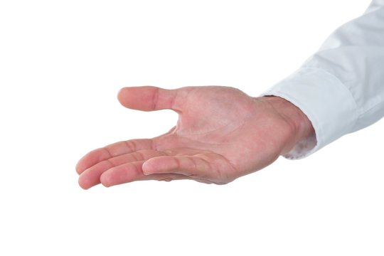 Hand of man gesturing against white background
