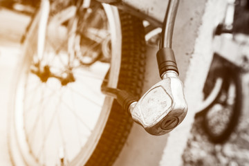 Fototapeta premium Security lock blocking the bicycle wheel.