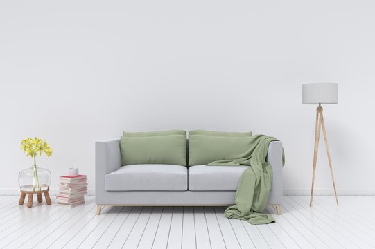 Interior with velvet sofa and lamp on empty white wall background. 3D rendering
