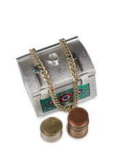 Metal chest and gold coins on white background