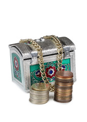 Metal chest and gold coins on white background