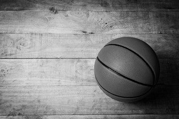 A basketball on a wood