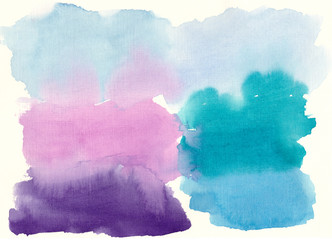 Multicolored paint stains on paper