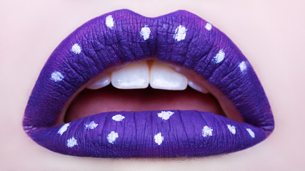 Fototapeta premium Passionate lips. Beautiful makeup close up. Opened mouth. Macro photography, small depth of field
