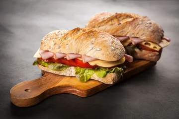 Foto op Canvas Delicious ciabatta sandwich © George Dolgikh
