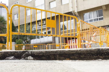 damaged road by rupture of water  pipeline in city street