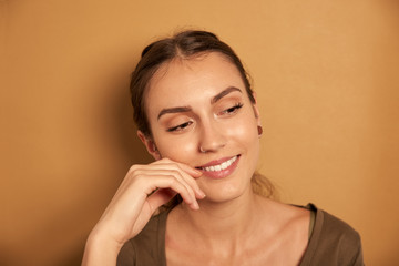 Beautiful young woman with a toothy smile