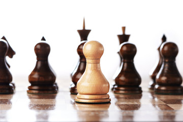 Lonely white pawn in front of enemy