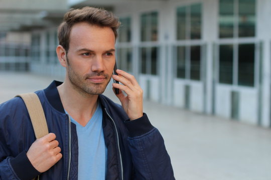 Cute Student Calling By Phone On Campus With Copy Space