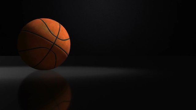 Basketball Spinning Isolated on Black Background, seamles looping