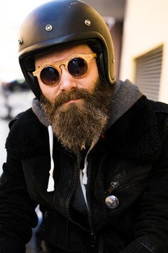 Bearded biker wearing sunglasses