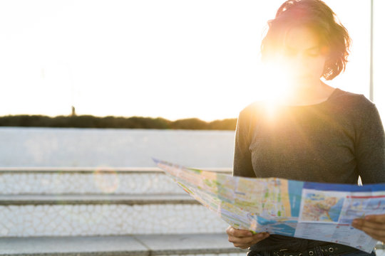 Woman looking at a map