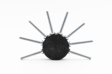 Closeup silver zinc coated screw isolate on white background. The threaded screws to M4. Isolated fasteners. Connecting material on white background. Silver threads on bolts. Screws on a round magnet.