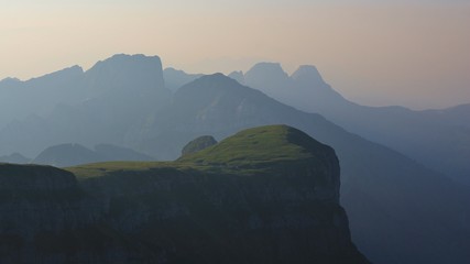 Early morning in the Swiss Alps. Summer scene on the Chaserrugg. Mountain peaks at sunrise.