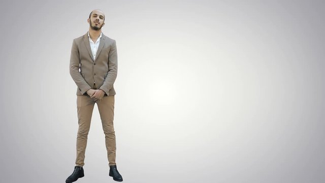 Businessman presenting project to the camera on white background.
