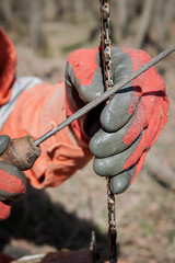 Close-up professional chainsaw blade,sharp chain rasp.the chain on the saw for cutting wood